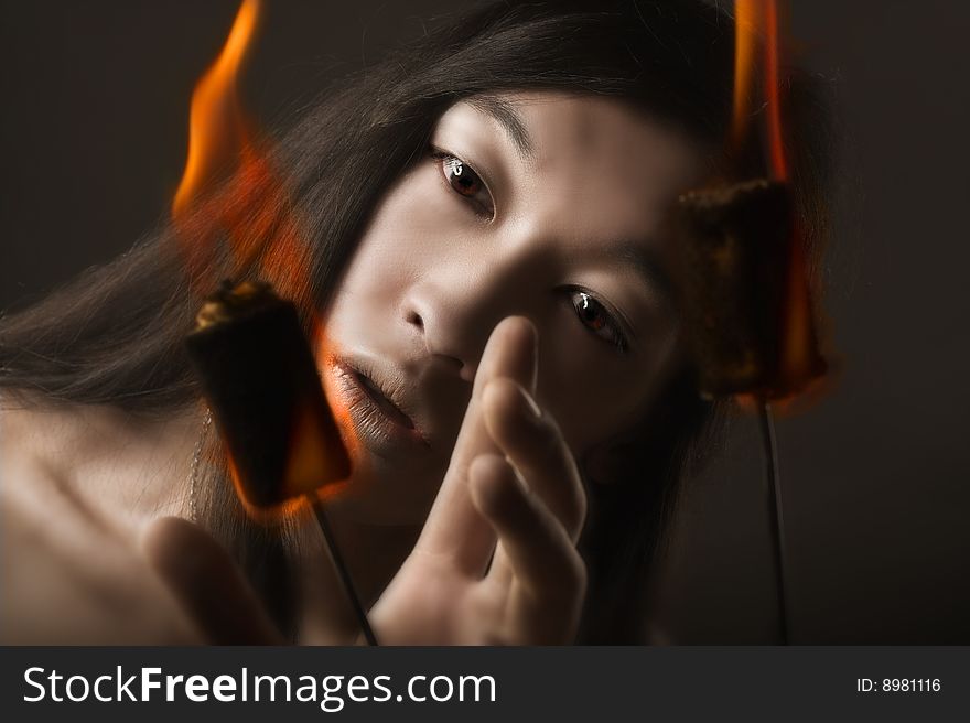 Portrait of asian man with fire. Portrait of asian man with fire