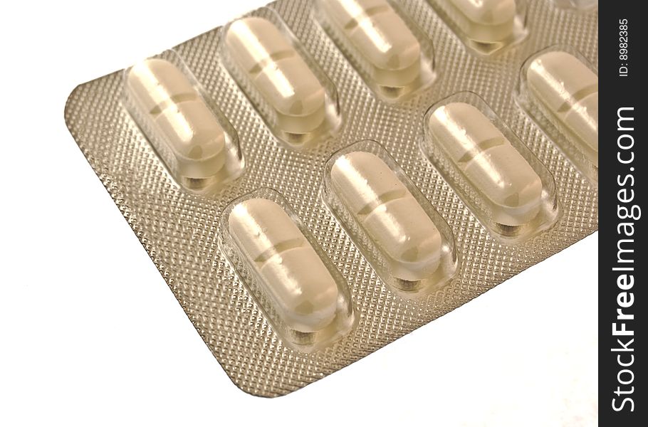 Pack of pills isolated over white background