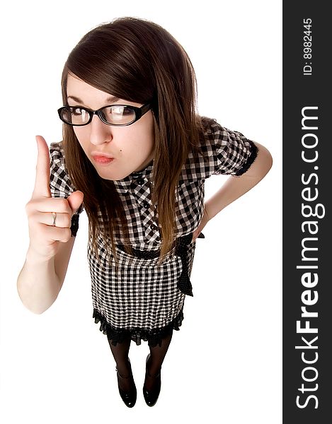 Young girl with glasses shows a finger up on white background