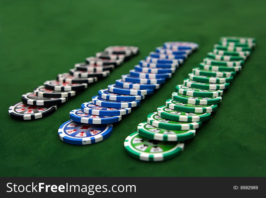 Poker table with chips in a row