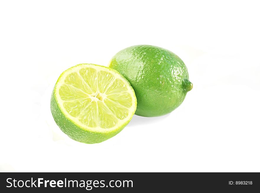 Juicy limes on white background. Juicy limes on white background.