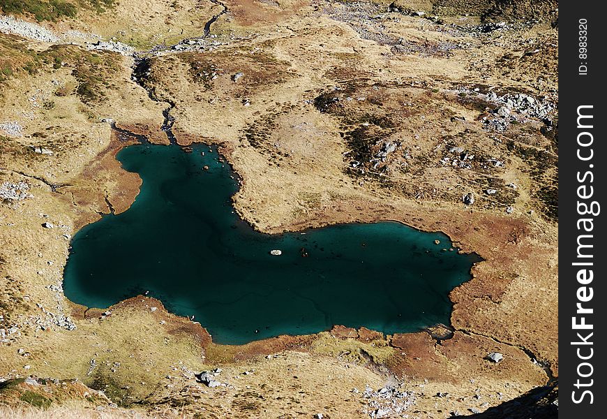 Lake on the top of the mountain in national park romania. Lake on the top of the mountain in national park romania