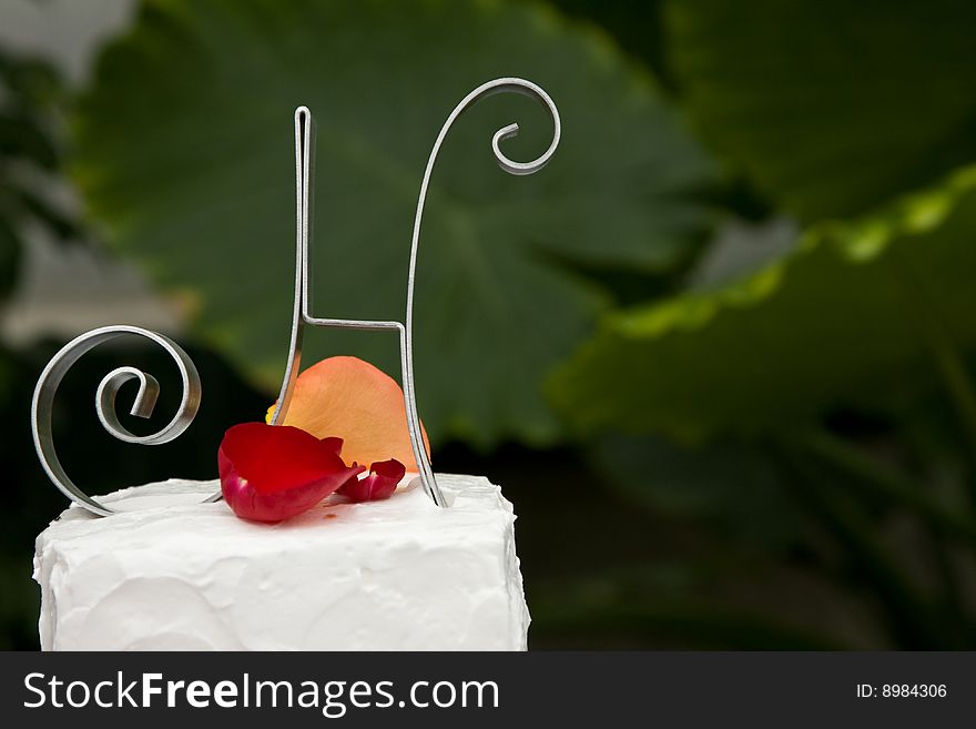 Wedding cake with rose petals