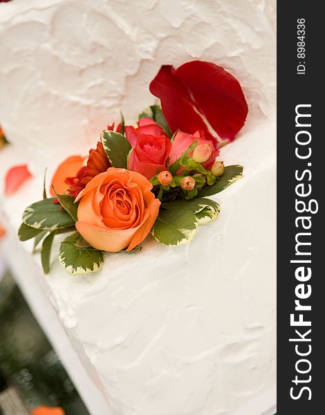 Wedding cake with rose petals
