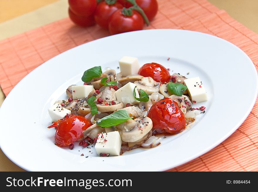 Mozzarella with mushrooms , mint ant baked cherry tomatoes.