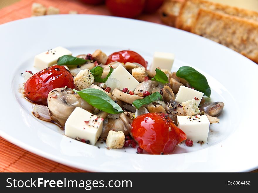 Mozzarella with mushrooms , mint ant baked cherry tomatoes.