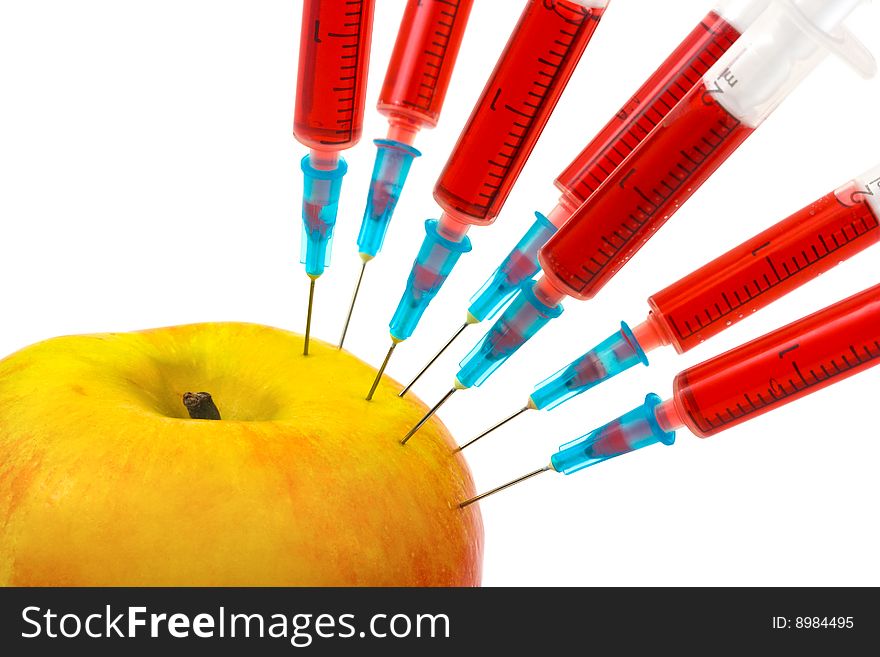 Apple and syringes isolated on white background