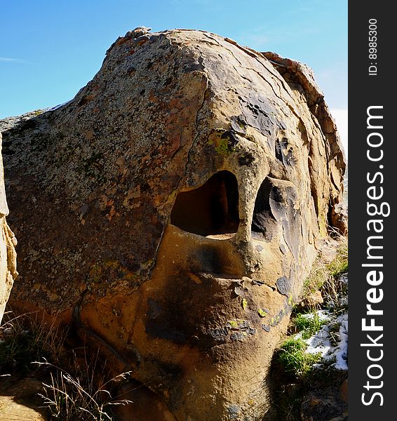 A rock found with a skeleton looking face. A rock found with a skeleton looking face