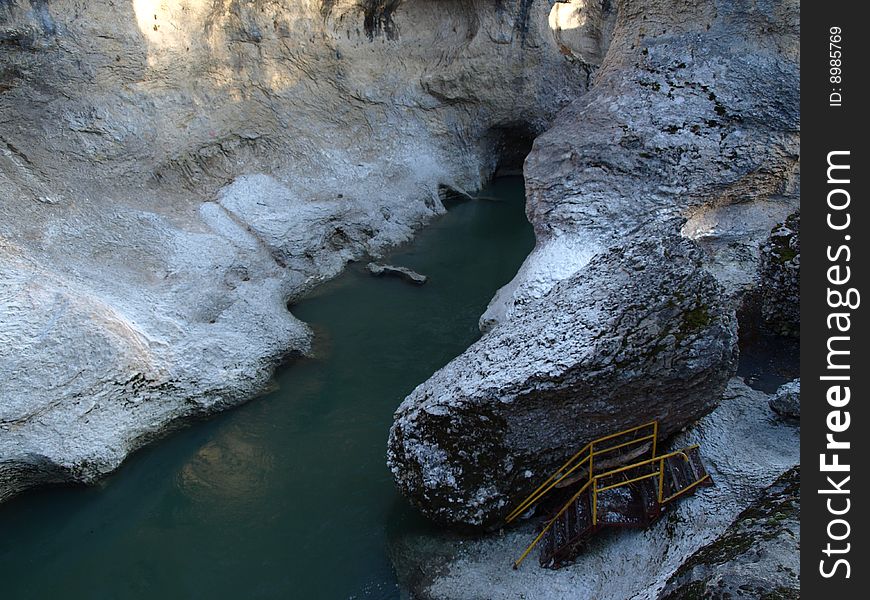 The mountain river Laba in gorge deep