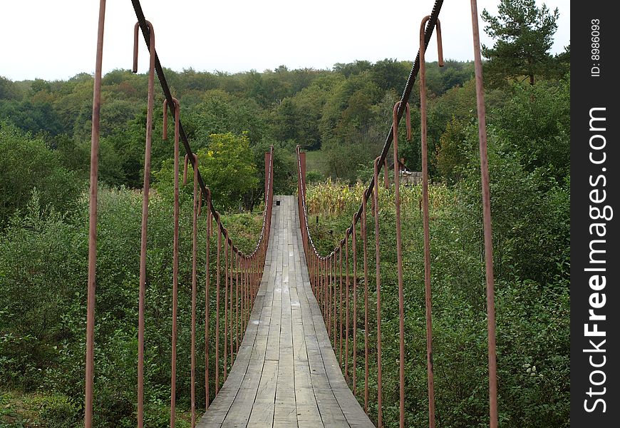 Suspension bridge through the river Small Laba