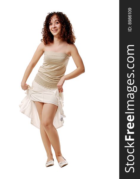 Funny girl in a light clothes on a white background
