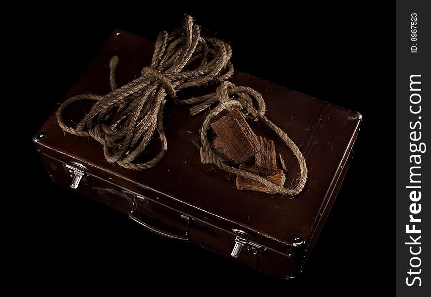 Rope And Soap Bar On Suitcase