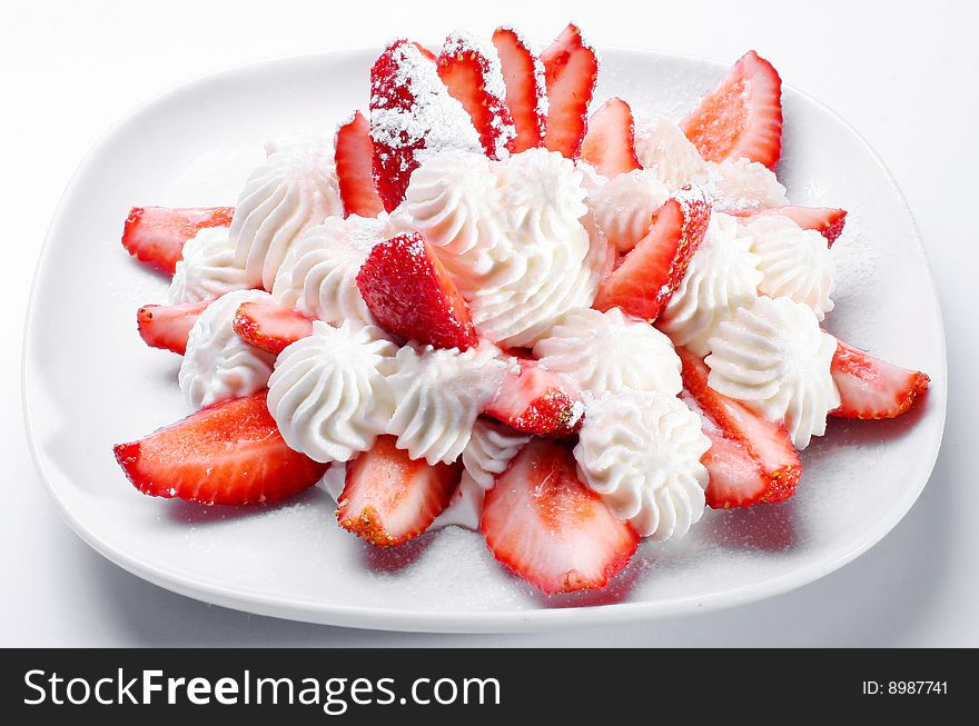 Dessert from a strawberry with creams. Dessert from a strawberry with creams.