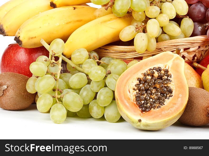 Various fresh fruits on a white background