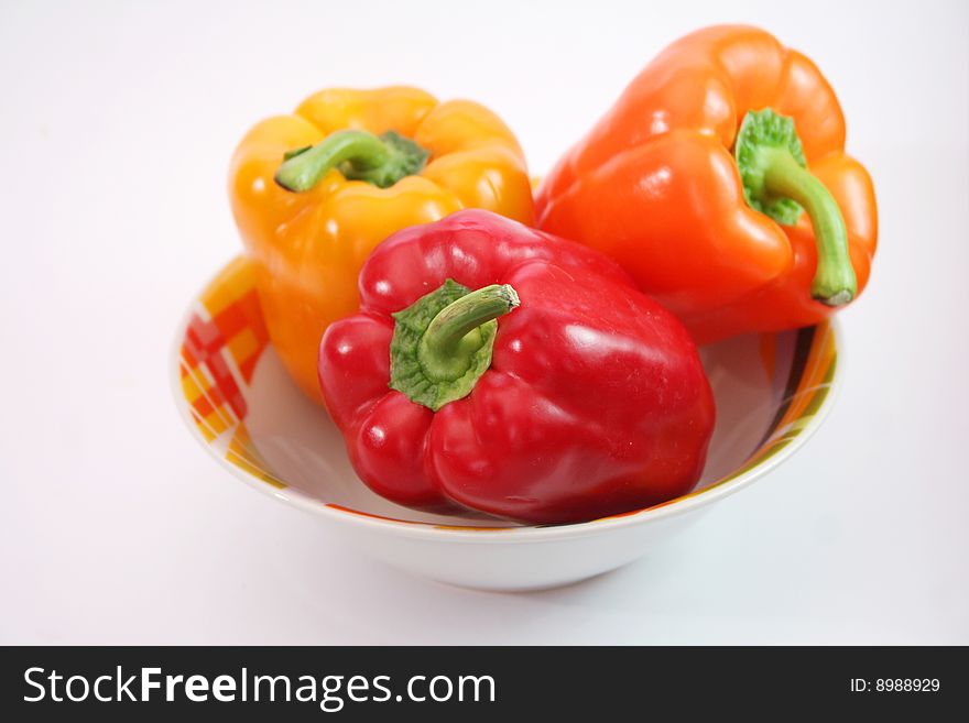 Fresh mixed paprika in a colourful bowl. Fresh mixed paprika in a colourful bowl