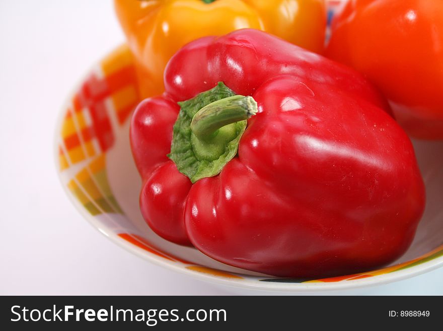 Fresh mixed paprika in a colourful bowl. Fresh mixed paprika in a colourful bowl