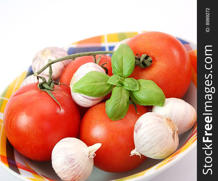 Some fresh tomatoes with garlic and basil