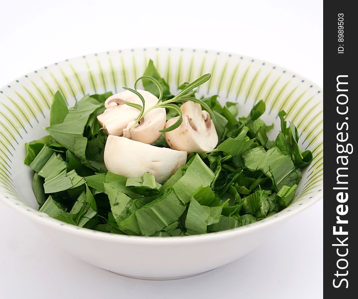 Fresh ramson with mushrooms in a bowl