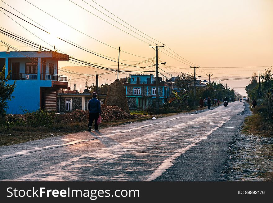 Street through town at sunset