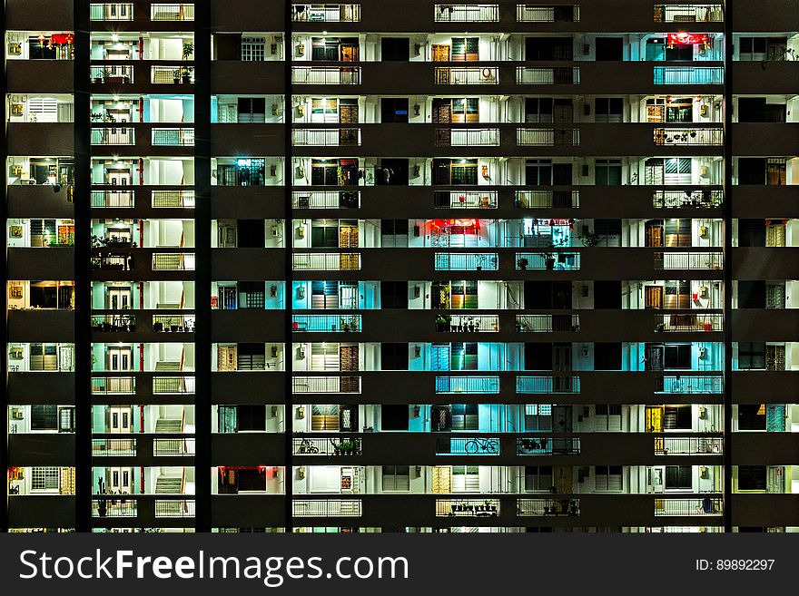 Exterior of modern apartment or office block. illuminated at night. Exterior of modern apartment or office block. illuminated at night