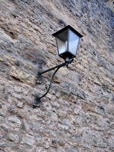 Forged Street Lamp On The Wall Stock Photography Forged Street Lamp On The Wall Stock Photography