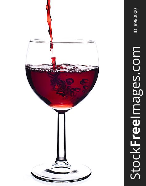 Red wine in glass with white background