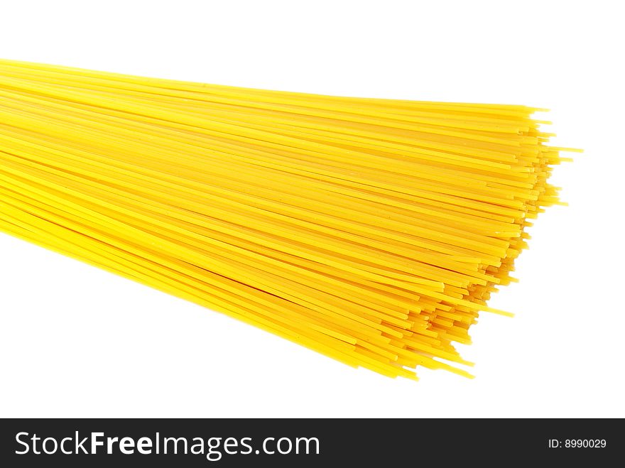 Yellow pasta on white background