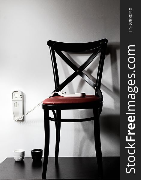 Photo of chair beside interphone