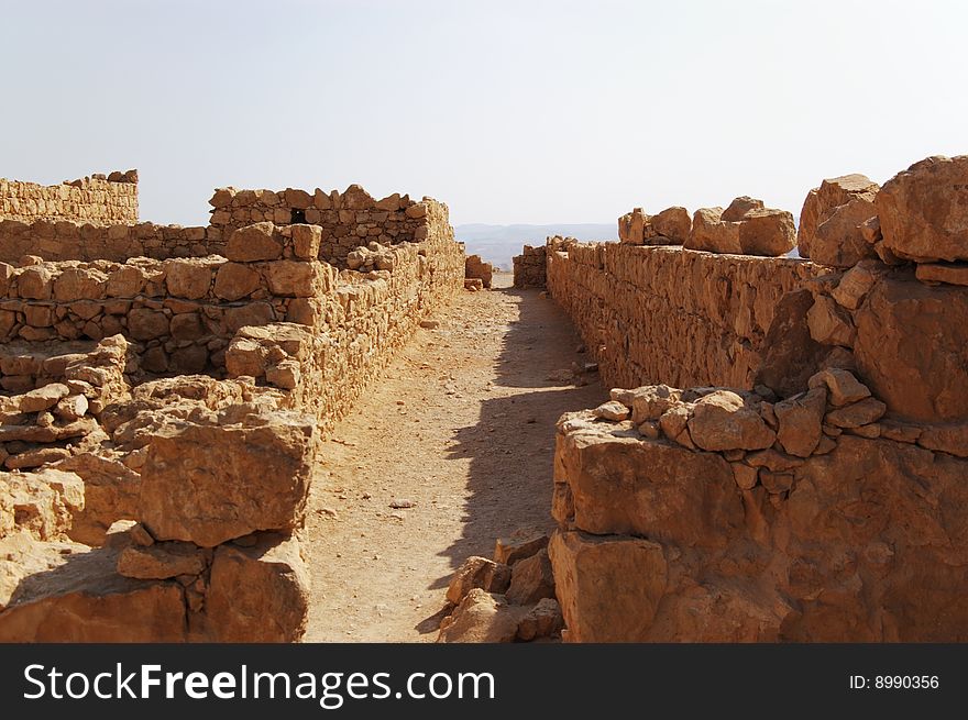 Ruined stone walls in Masada fortress, Israel. Ruined stone walls in Masada fortress, Israel
