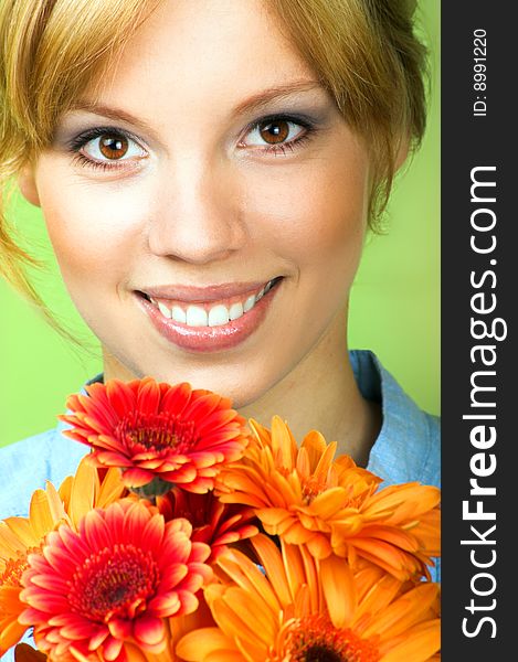 Beauty portrait of a young woman with a flowers. Beauty portrait of a young woman with a flowers
