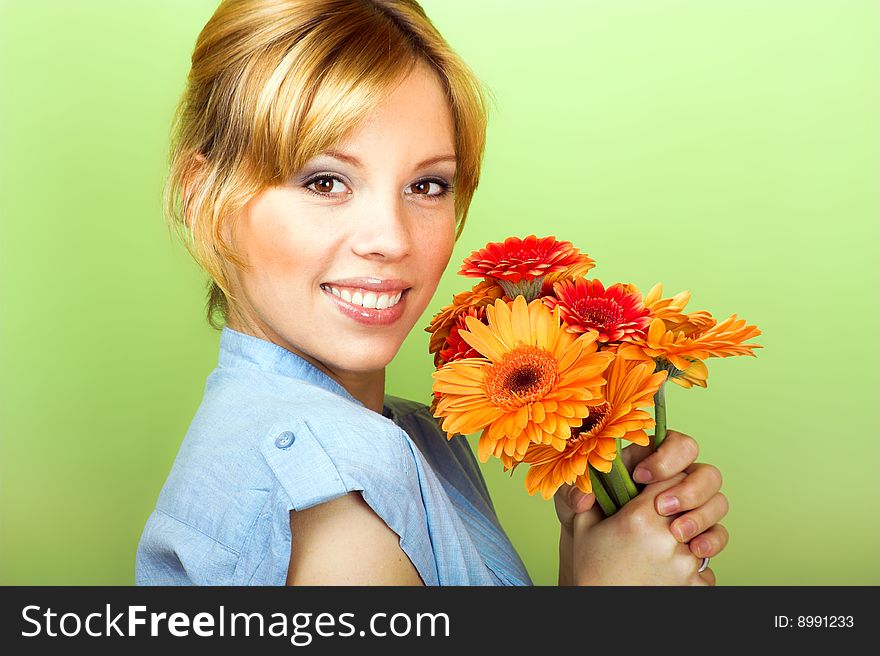 Beauty portrait of a young woman with a flowers. Beauty portrait of a young woman with a flowers