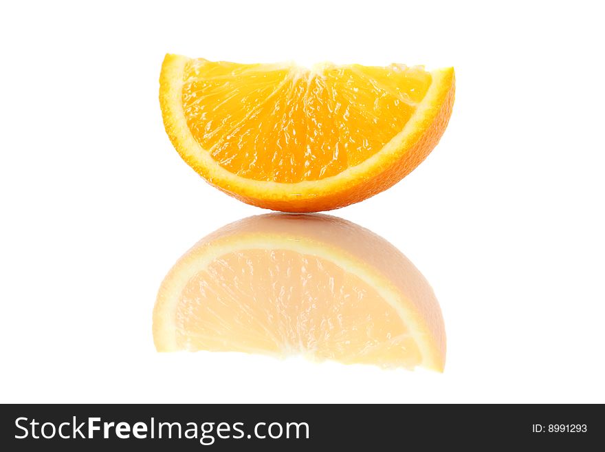An orange piece isolated on white background. An orange piece isolated on white background.