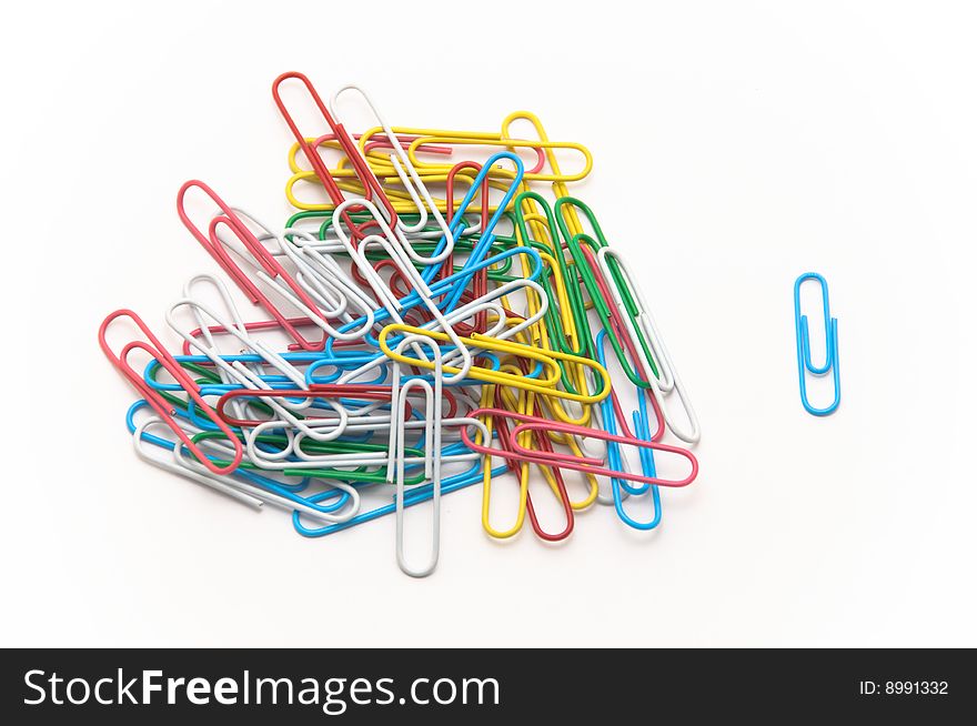 Colored paperclips isolated on white background