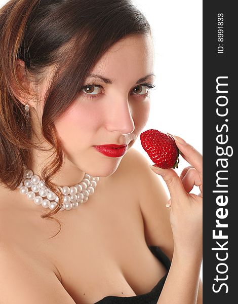 Sexy young woman eating fresh strawberry. Sexy young woman eating fresh strawberry