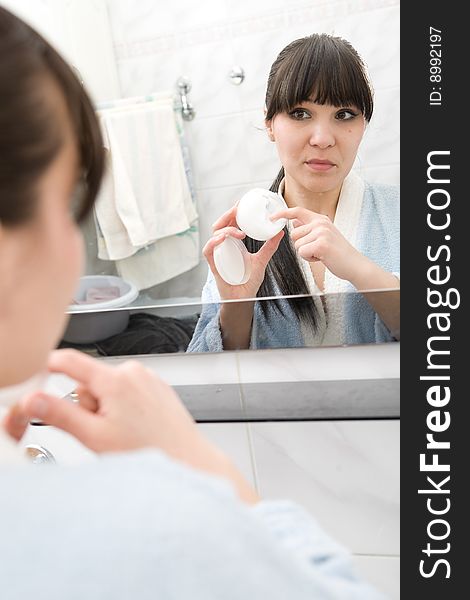 Happy brunette woman in bathroom. Happy brunette woman in bathroom