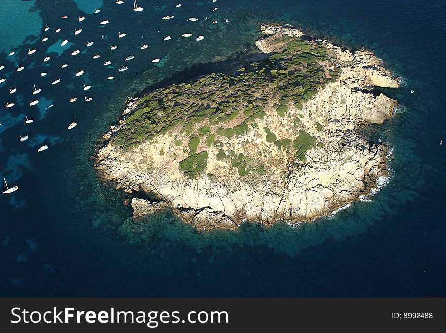 View from the air to an island in Mediterranean sea. View from the air to an island in Mediterranean sea
