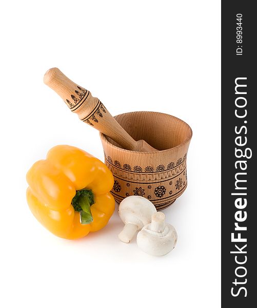 Vegetables and mortar on a white background