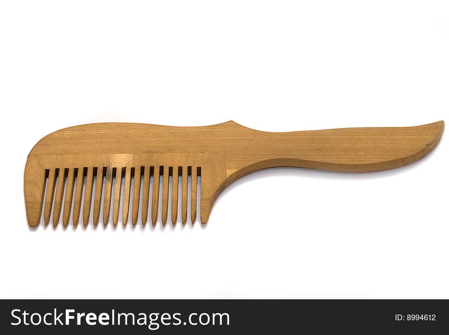 Wood comb on white background