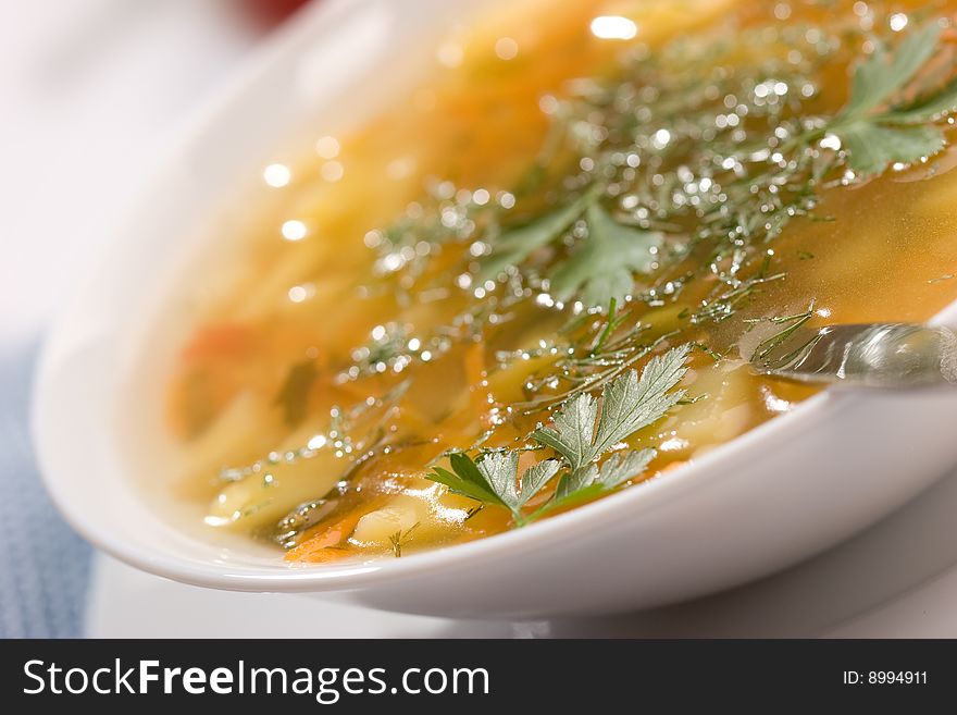 Food: macro picture of soup with parsley