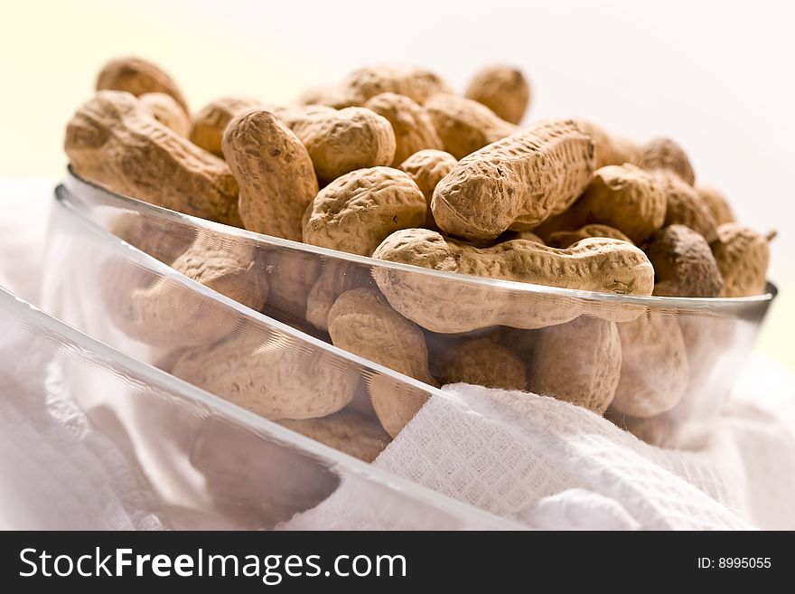 Foodstuff theme:  peanut on the glassy bowl