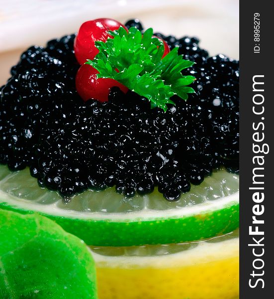 Coctail decoration consisting of blueberry and lemons. Coctail decoration consisting of blueberry and lemons