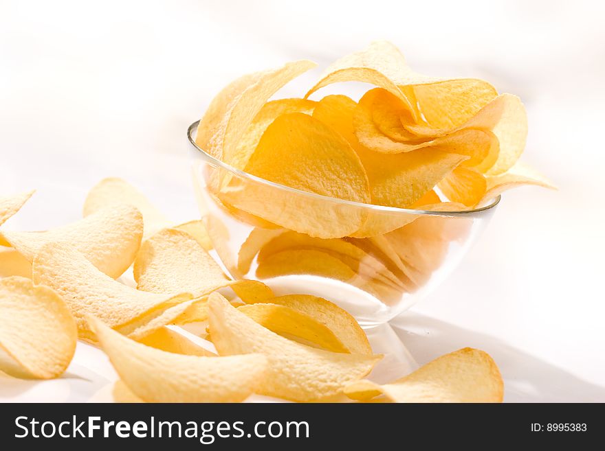 Food series: golden background of potato chips