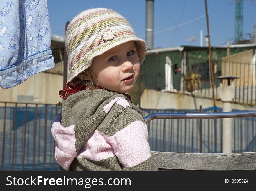 Portrait Of A Sweet Girl With The Clothesline