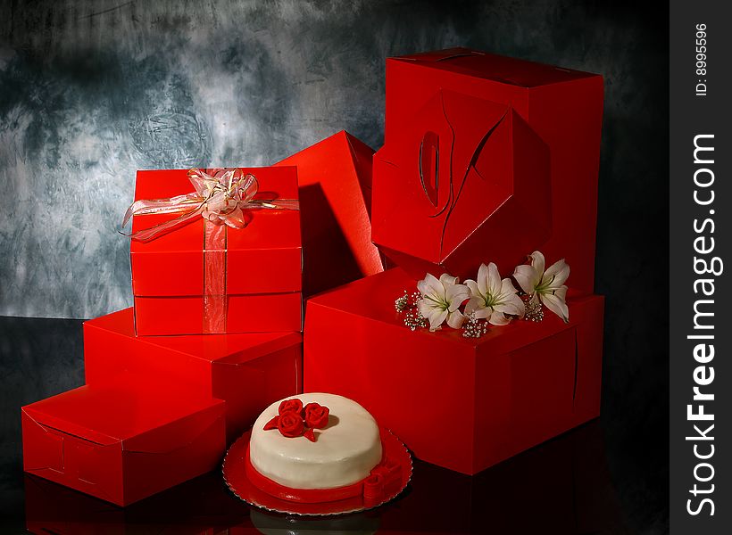 Red luxury boxes on dark background. Red luxury boxes on dark background