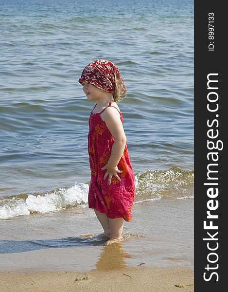 Sweet little girl on the beach. summertime. Sweet little girl on the beach. summertime