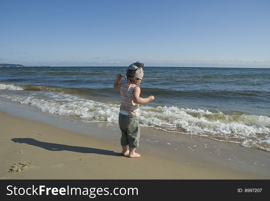 Sweet little girl on the beach. summertime. Sweet little girl on the beach. summertime