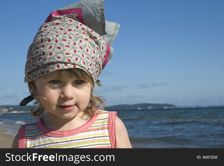 Sweet little girl on the beach. summertime. Sweet little girl on the beach. summertime