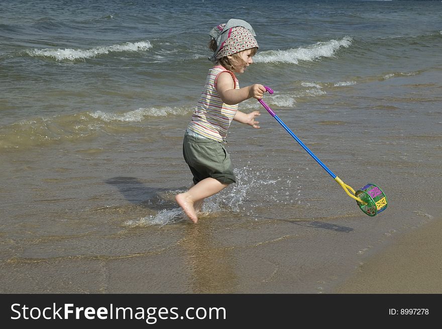 Sweet little girl on the beach. summertime. Sweet little girl on the beach. summertime