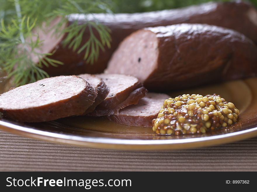 Detail of sausages with herbs