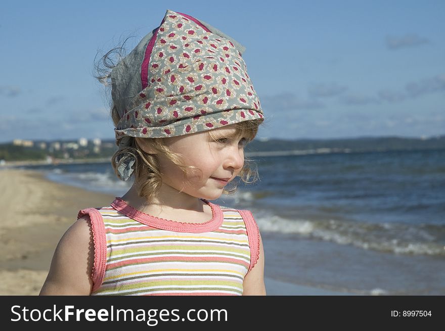 Sweet little girl on the beach. summertime. Sweet little girl on the beach. summertime